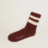 Calcetines morados con detalles desgastados y rayas blancas desgastadas