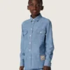 Camisa unisex Journey de cambray de algodón azul claro con dobladillo con flecos y parche bordado