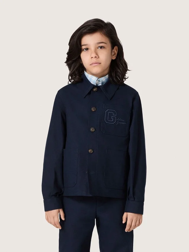 Camisa unisex Journey de lona de algodón azul con logotipo bordado