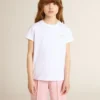 Camisas blancas y plateadas con logotipo y estrella grande en purpurina plateada