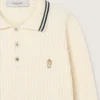 Camisas de manga larga para hombre en tejido de punto blanco con bordes en contraste y un broche removible