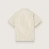 Camisas de niños a rayas en color crudo, beige y gris con bordado «Frutteria Golden»