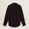 Camisas negras para mujer con rayas verticales y cierre con nudo lateral