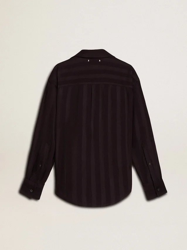 Camisas negras para mujer con rayas verticales y cierre con nudo lateral
