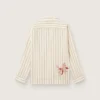 Camisas unisex de algodón y lino a rayas en tonos crudo y arena con bordados