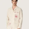 Camisas unisex de algodón y lino a rayas en tonos crudo y arena con bordados