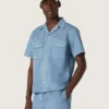Camisas unisex de denim azul claro con bordado en la espalda