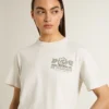 Camiseta blanca para mujer con estampado negro en el pecho