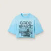 Camiseta corta para mujer en jersey de algodón azul claro con estampado gráfico