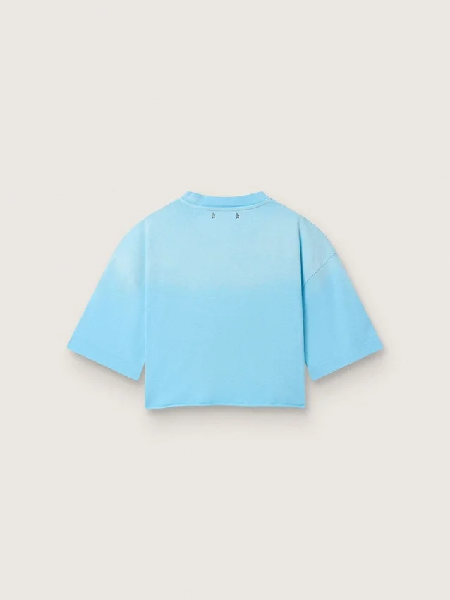Camiseta corta para mujer en jersey de algodón azul claro con estampado gráfico