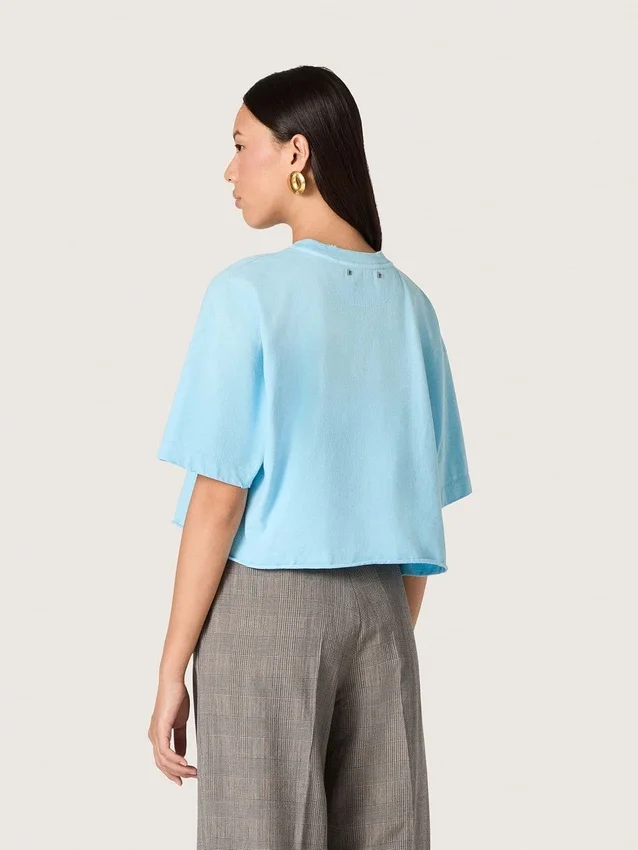 Camiseta corta para mujer en jersey de algodón azul claro con estampado gráfico