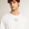 Camiseta de algodón para hombre en blanco desgastado con letras negras