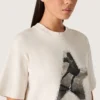 Camiseta de mujer en jersey de algodón blanco con estampado de estrellas