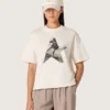 Camiseta de mujer en jersey de algodón blanco con estampado de estrellas