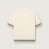 Camiseta de punto blanca para mujer con bordes en contraste y broche desmontable