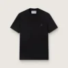 Camiseta negra de la Star Collection con una estrella tono sobre tono en el frente