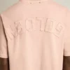 Camiseta rosa polvo con logotipo invertido en la espalda - Jersey Capsule