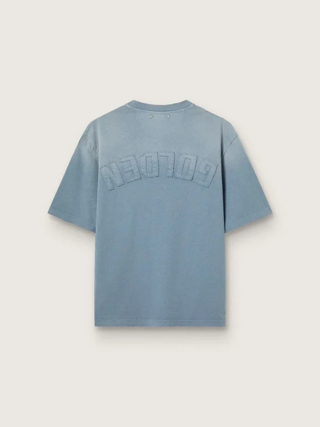 Camiseta unisex de algodón en azul claro con estampado invertido en la espalda