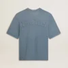 Camiseta unisex de algodón en azul claro con estampado invertido en la espalda