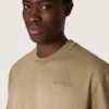 Camiseta unisex de jersey de algodón color beige con logotipo bordado