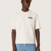 Camiseta unisex de la colección Resort, de algodón blanco con estampado y logotipo