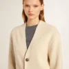 Cardigan beige para mujer con la inscripción «Golden» en la espalda