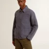 Chaqueta azul para hombre de algodón denim con acabado desgastado