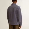 Chaqueta azul para hombre de algodón denim con acabado desgastado