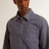 Chaqueta azul para hombre de algodón denim con acabado desgastado