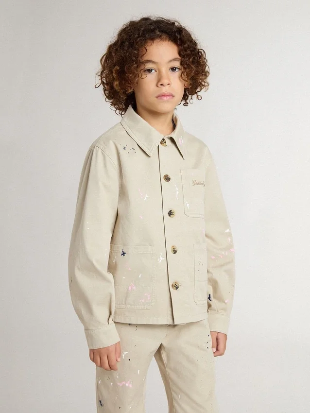 Chaqueta beige para niños con salpicaduras multicolores
