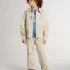Chaqueta beige para niños con salpicaduras multicolores