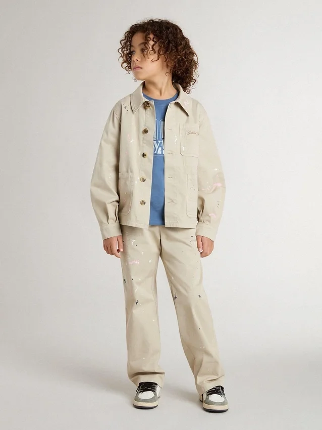 Chaqueta beige para niños con salpicaduras multicolores