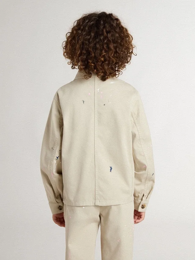 Chaqueta beige para niños con salpicaduras multicolores