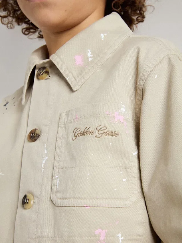 Chaqueta beige para niños con salpicaduras multicolores