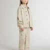 Chaqueta beige para niños con salpicaduras multicolores