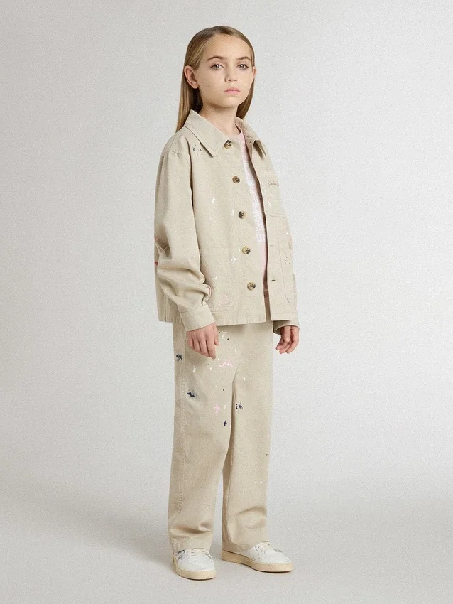 Chaqueta beige para niños con salpicaduras multicolores