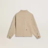 Chaqueta beige para niños con salpicaduras multicolores