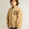 Chaqueta bomber de felpa beige para niños