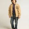 Chaqueta bomber de felpa beige para niños