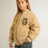 Chaqueta bomber de felpa beige para niños