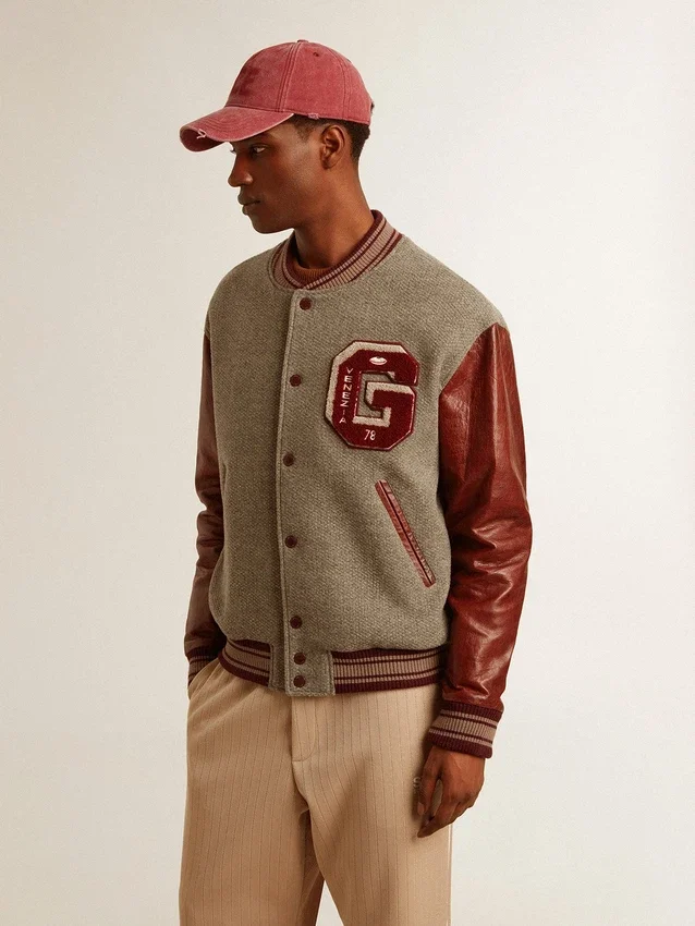 Chaqueta bomber de lana gris jaspeada con mangas de cuero