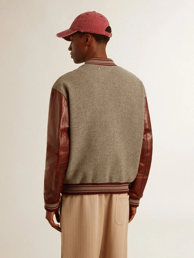 Chaqueta bomber de lana gris jaspeada con mangas de cuero