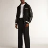 Chaqueta bomber de lana negra con parche