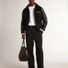 Chaqueta bomber de lana negra con parche