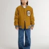 Chaqueta bomber de lana para niños en amarillo ocre con parche