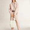 Chaqueta bomber de mezclilla teñida de rosa para mujer
