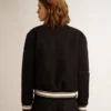 Chaqueta bomber para mujer de lana azul oscuro con detalles en blanco