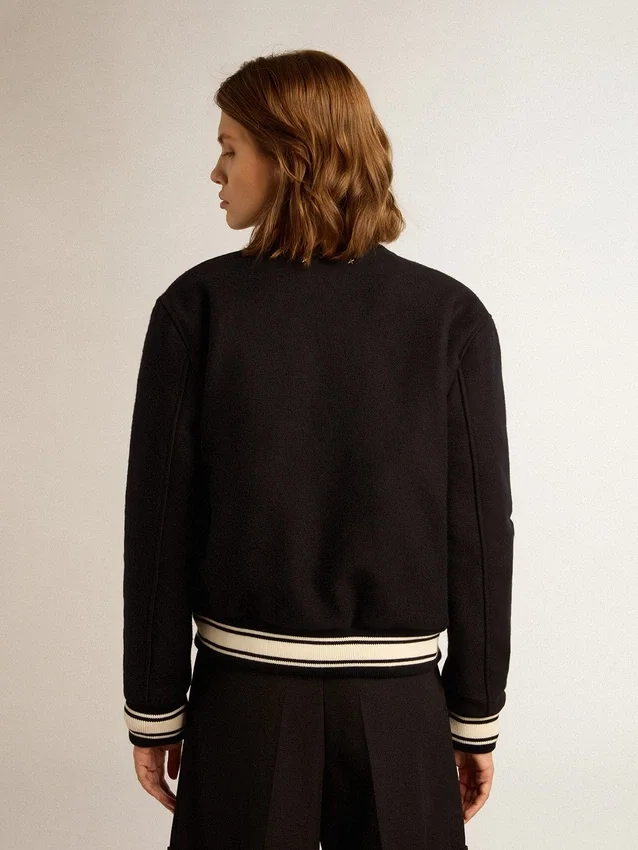 Chaqueta bomber para mujer de lana azul oscuro con detalles en blanco