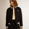 Chaqueta bomber para mujer de lana azul oscuro con detalles en blanco