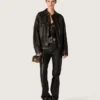 Top de mujer de tul negro con estampado floral de lentejuelas negras